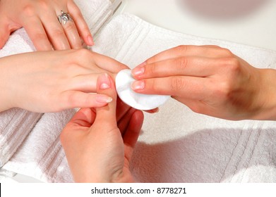 Master Cleaning The Nail Of A Woman