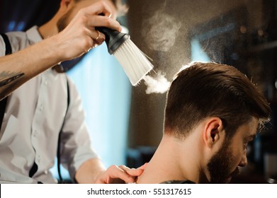 Master Cuts Hair And Beard Of Men In The Barbershop, Hairdresser Makes Hairstyle For A Young Man