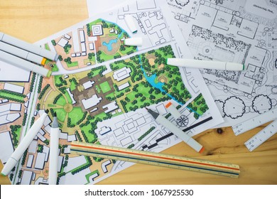 Master Plan Of Urban Landscape Design Or Urban Architecture Drawing With Drawing Tools , Color Markers, Scale Rulers On The Table, Selective Focus  