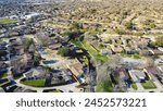 Master Planned Communities DFW Dallas Fort Worth subdivision design with cul-de-sac dead-end residential street that shapes like keyholes, aerial view single family houses swimming pools backyard. USA