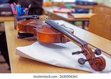 master violin with bridge close-up on table in music class