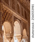 Masterful arabesque plaster work preserved among the ruins of the moorish Alhambra, Granada, Andalusia, Spain