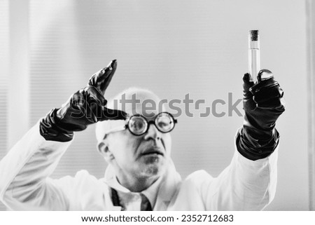 Mastermind in a lab coat devises forbidden substances in a black and white early 20th-century setting, hinting at concealed alliances with or deception of governments