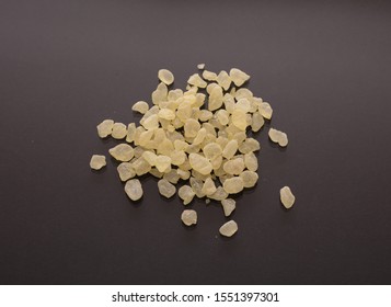 Mastic Resin Tears. Chios Mastic On Gray Black Background