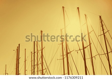 Similar – Silhouettes of the masts of a sailing ship