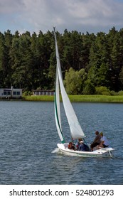 MASURIA, POLAND - JULY 13: Unidentified People Sailing On Mazury Lake On July 13, 2012 In Masurian District, Poland. More Than 5 Million Tourists Visit Masuria Every Year.