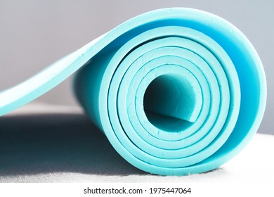 Mat For Practicing Yoga, Pilates And Stretching Exercises. No People