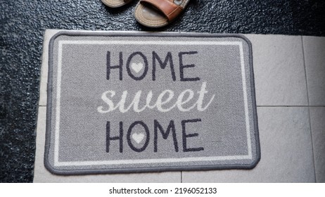 The Mat That Says Home Sweet Home Is Usually Placed In Front Of The Main Door