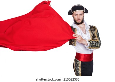 Matador Throw A Red Cape. Studio Portrait Isolated On A White Background  