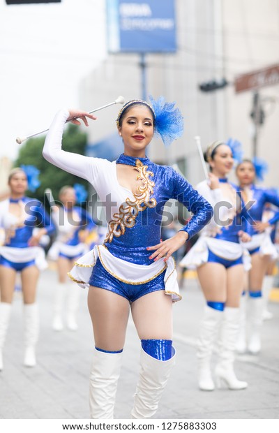 Matamoros,\
Tamaulipas, Mexico - November 20, 2018: The November 20 Parade,\
Mexican Cheerleaders dancing during the\
parade