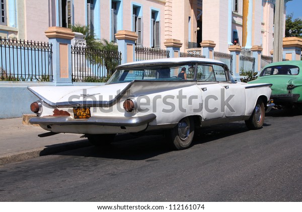 MATANZAS, CUBA - FEBRUARY 22: Old American Buick
Electra on February 22, 2011 in Matanzas, Cuba. New change in law
allows Cubans to trade cars. Cars in Cuba are very old because of
the old law.