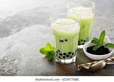 Matcha Bubble Tea With Tapioca Pearls In Tall Glasses