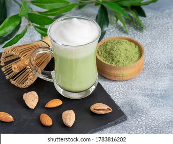 Matcha Cappuccino With Almond Milk Cup Close-up Background Blurred. 