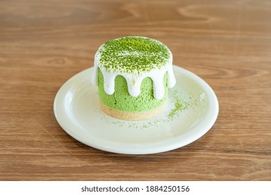 matcha green tea cheese cake on table in cafe restaurant - Powered by Shutterstock