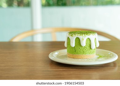 matcha green tea cheese cake on table in cafe restaurant - Powered by Shutterstock