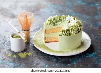 Matcha Green Tea Cream Cake. Almond Lemon Sponge Or Chiffon Cake On A Plate, Selective Focus