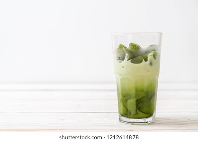 Matcha Green Tea Ice Cube With Milk In Glass