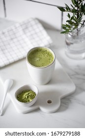 Matcha Green Tea Latte In A Rustic Cup.