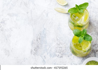 Matcha Iced Green Tea With Lime And Fresh Mint On A Marble Background Copy Space Top View