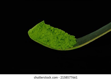 Matcha Powder. Organic Green Matcha Tea Ceremony. Traditional Japanese Drink On Black Wooden Background. High Quality Photo