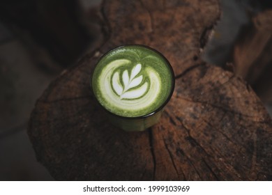 Matcha Tea Latte On Table Backgruond