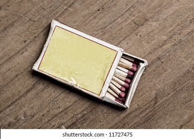 Matchbox On Old Table.