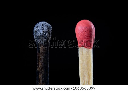 Matches in high magnification. Accessories for lighting a fire and bonfire. Dark background.