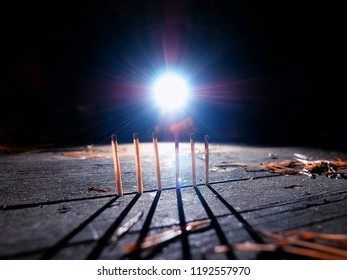 Matches on the table with dramatic lightning background