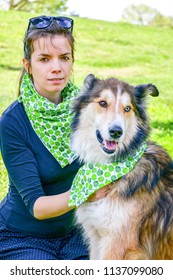 Matching Dog And Owner Outfit. Girl And Her Collie Dog  With Matching Bandana