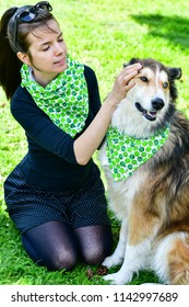 Matching Dog And Owner Outfit. Girl And Her Collie Dog  With Matching Bandana