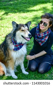 Matching Dog And Owner Outfit. Girl And Her Collie Dog  With Matching Bandana