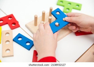 Matching the shapes. 3D wooden constructor. Implement for learning to count. Addition and subtraction exercises. Montessori methodology for nursery and preschool children.