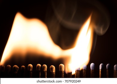 Matchsticks Are Burning, Chain Reaction With Fire And Flames, Black Background