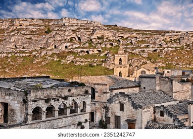 Matera, Basilicata, Italy: landscape at sunset of the picturesque old town called stones of Matera with the ancient caverns on the other side of the ravine