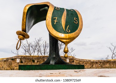 Matera, Italy - March 12, 2019: Sculpture Dalí's melted clock displayed on the street on the occasion of the cultural capital of the city.
