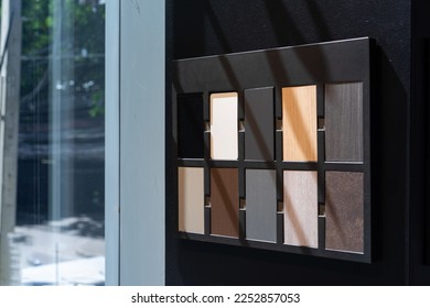 Material Example of wood type and colour for customer in kitchen showroom, show texture and design of their material.