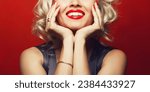 Material girl and femme fatale concept. Marilyn Monroe, Madonna style. Close up portrait of rich young woman smiling wearing expensive luxurious golden ring, bracelet. Perfect shiny smile. Studio shot