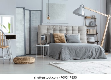 Material Pouf On Floor And Lamp In Design Modern Bedroom 