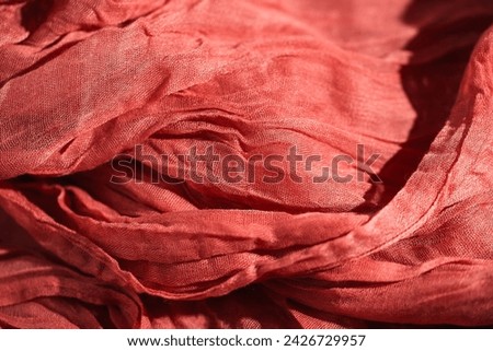 material structure, minimalist background. The orange color is intense and juicy, an abstract type of fabric.fabrick background