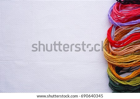 Materials for crosstitching withcolorful threads