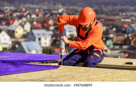 Materials Requirements. Install Partially Overlapping Layers Of Material Over Roof Insulation Surfaces. Master Repair Roof. Flat Roof Installation. Roofer Constructing Roof. Man Roofing Surface