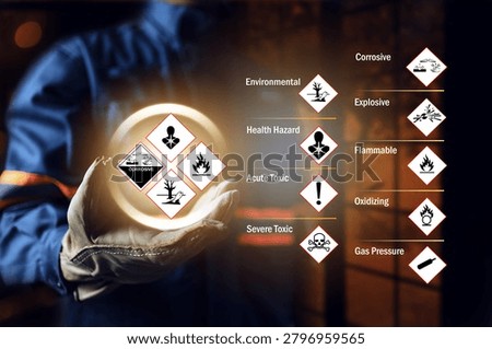 Materials safety data sheet concept with safety staff wearing leather glove holding GHS globally harmonized safety chemical hazard sign to warning in working site