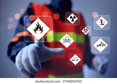 materials safety data sheet MSDS concept with safety staff pointing on flammable warning sign virtual interface represents working on dangerous substances hazardous warning information