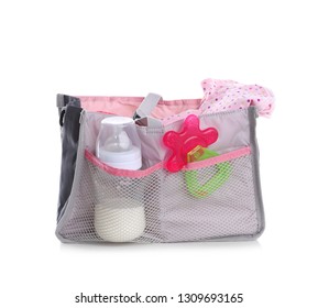 Maternity Bag With Baby Accessories On White Background