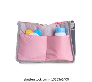 Maternity Bag With Baby Accessories On White Background