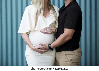 Maternity holding on stomach