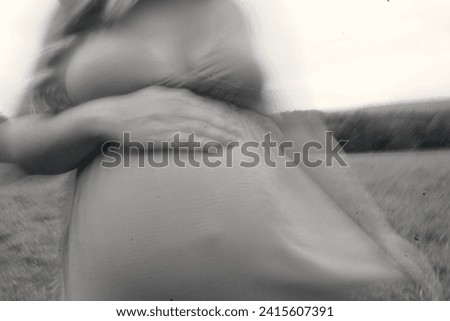 Similar – Baby sleeping on a blanket while her mother looks