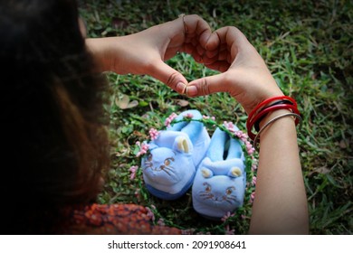 Maternity Shoot With Baby Shoes ...