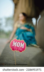 Maternity shoot pose for welcoming new born baby. ."selective focus" "shallow depth of field" "follow focus" or " blur".