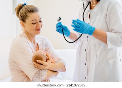 Maternity Ward. Mother With Newborn Baby At Hospital.